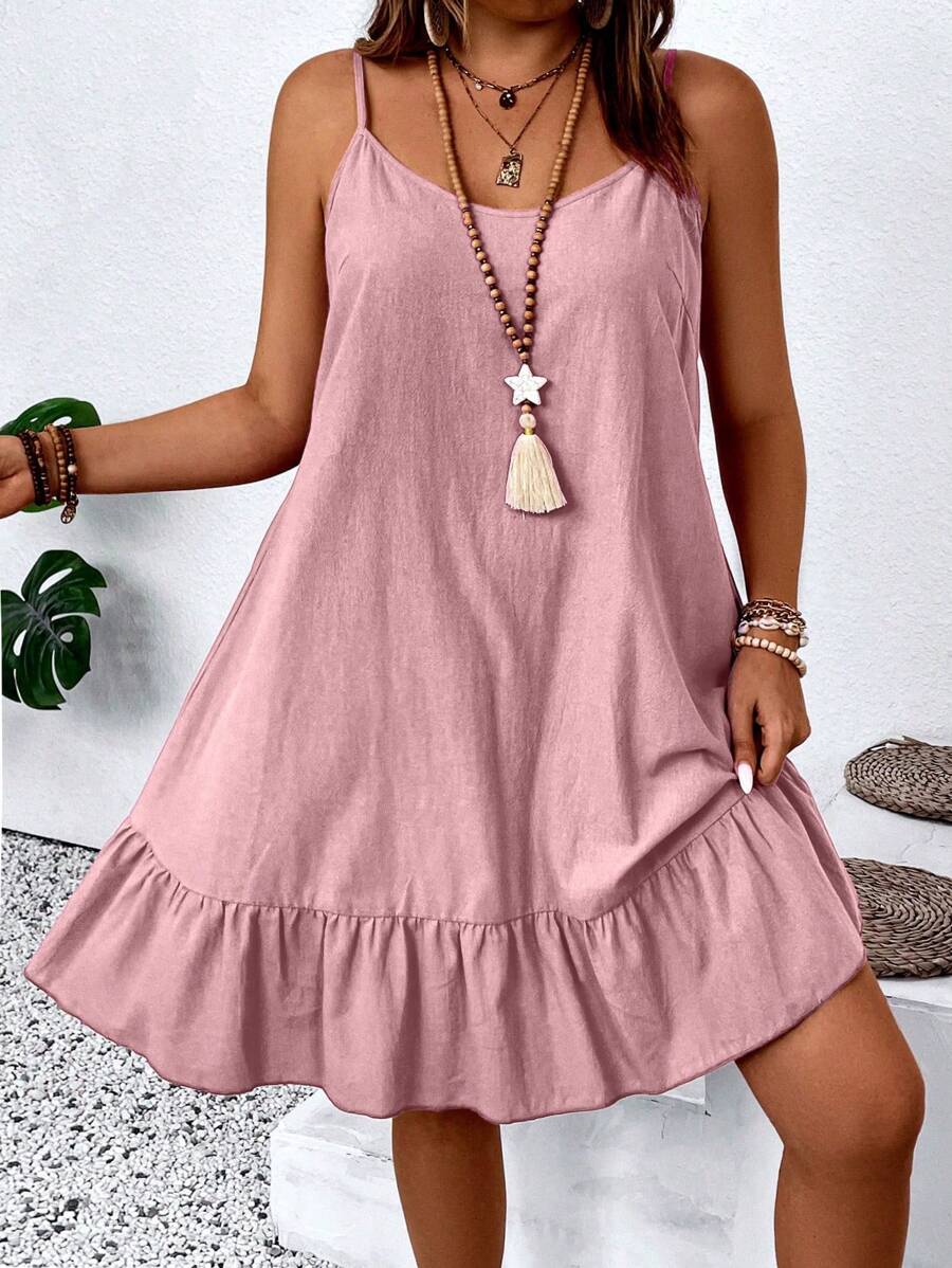 Embrace effortless summer style with this plus-size sleeveless dress designed for comfort and elegance. Delicate spaghetti straps provide a flattering silhouette while the ruffle pleats add playful movement and dimension to your look. The lightweight fabric keeps you cool during warm days, making it perfect for casual outings, beach trips, or relaxed gatherings.