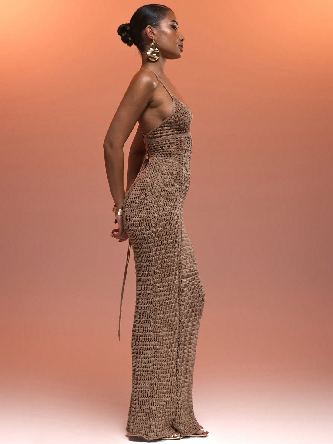 Get ready to turn heads with our Elegant Crochet Halter Neck Maxi Dress! Perfect for summer vacations, this dress features a sheer lace-up back that adds a touch of sexy to your Ibiza look. With its elegant crochet design, you'll look effortlessly chic and stylish wherever you go. Perfect for making a statement!