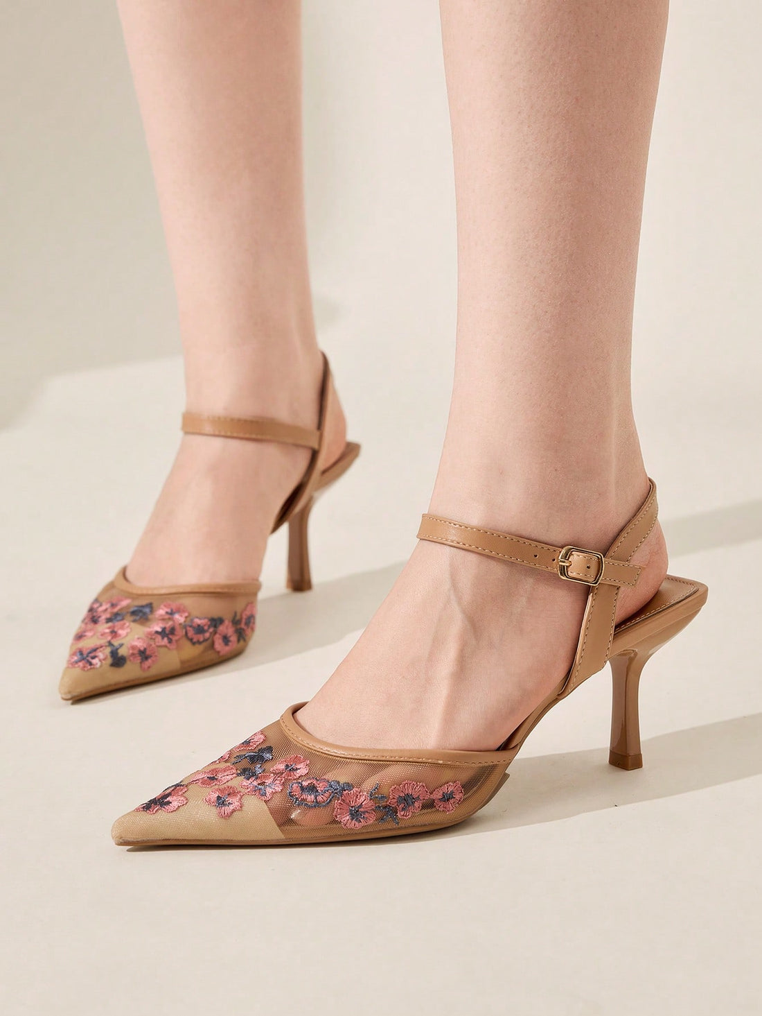 Step into charm with these Elegant Apricot Floral Embroidered Mesh Pumps! Perfect for weddings and parties, their delicate floral embroidery and airy mesh design add a touch of whimsy to any outfit. Slip them on effortlessly and enjoy the chic high heel silhouette that lifts your style and your spirits. Dance, mingle, and shine with playful elegance wherever you go!