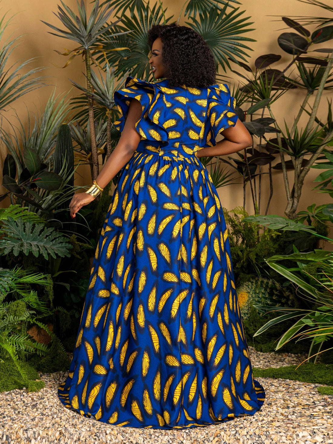 Make a vibrant statement this summer with our Chic Plus Size African Print Maxi Dress. Featuring playful ruffled sleeves and a flowing silhouette, this dress blends comfort and style effortlessly. Perfect for beach parties or any festive event, its bold prints and breezy fit will keep you cool and confident all day long. Dance through warm evenings in eye-catching elegance!