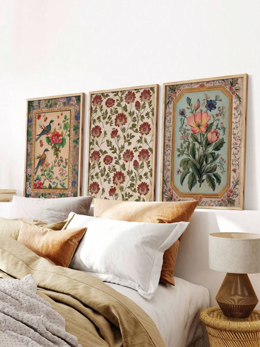 Vintage bird and floral canvas wall art triptych above a fireplace in a traditional living room