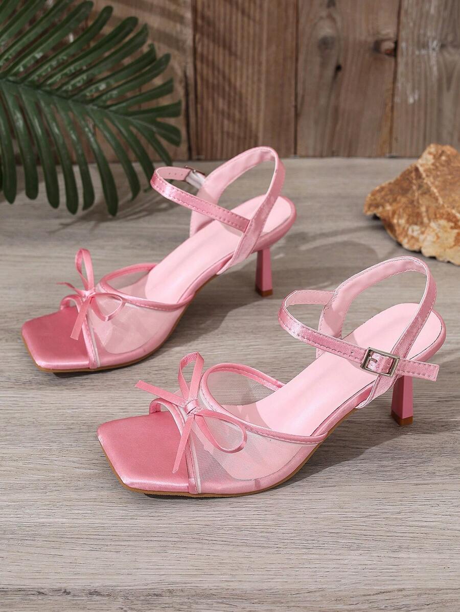 Step up your style game with these chic brown mesh high heel sandals! Featuring a playful bow and a sleek backstrap, these stilettos are perfect for turning heads at any formal event. The breathable mesh adds a flirty touch while keeping you comfortable enough to dance the night away. Elevate your outfit instantly with this fun and fashionable choice!