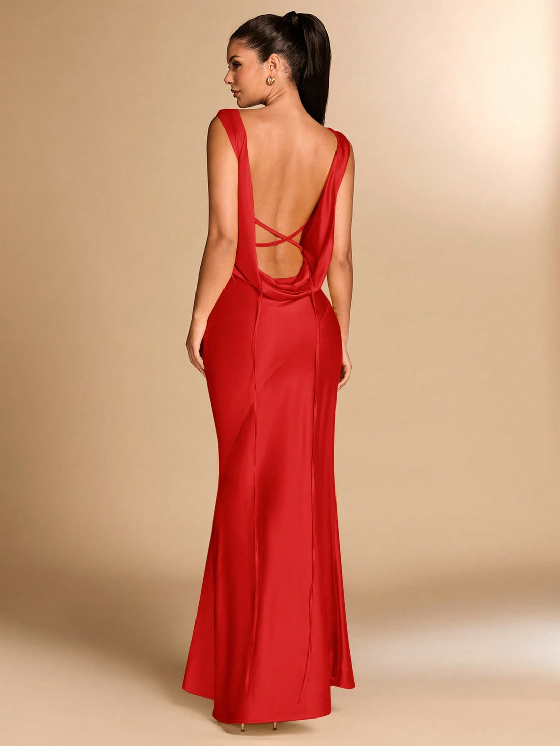 Get ready to turn heads with our Elegant Backless Draped Neck Dress! Perfect for cocktail parties and romantic dates, this dress will make you feel elegant and alluring with its spaghetti strap design and stylish draped neckline. Make a statement and feel confident in this stunning dress.