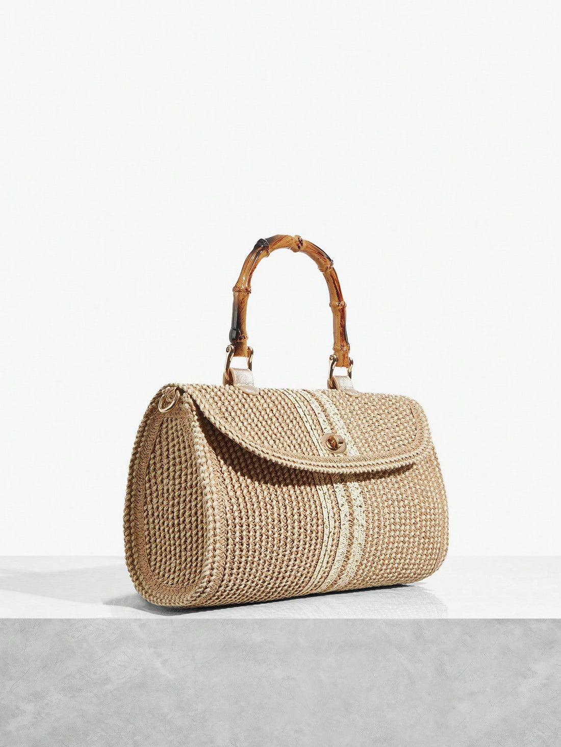 Step into summer with this playful straw bag featuring chic bamboo handles. Lightweight and breezy, it’s your go-to accessory for beach days and sunny getaways. Effortlessly stylish, it holds your essentials while adding a touch of natural charm to any outfit. Perfect for holidays where fun meets fashion!
