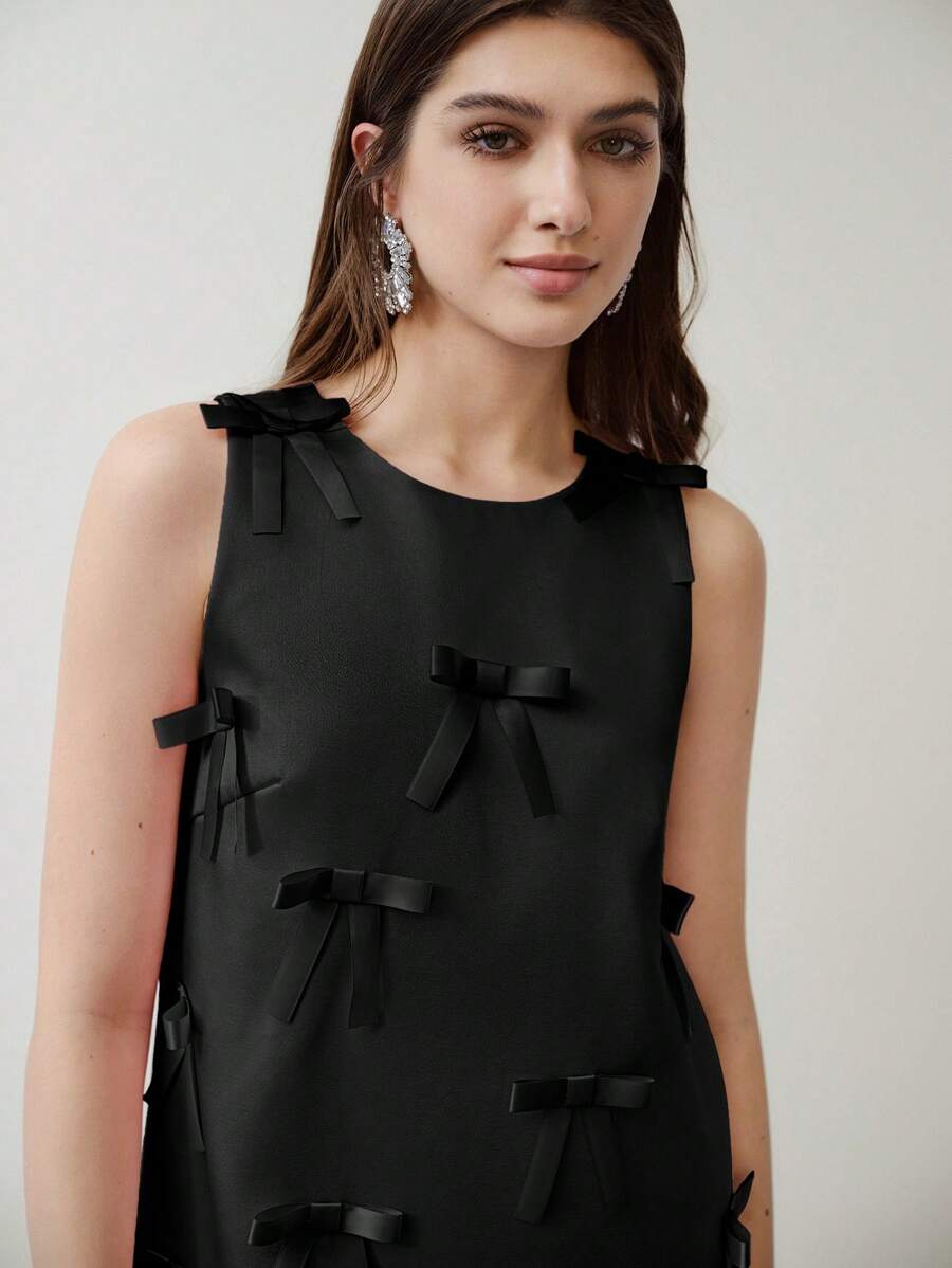 Charm your Valentine with this Elegant Bow Decor Sleeveless Dress, designed to make your romantic day unforgettable. Its graceful bow detail adds a touch of whimsy, while the sleeveless cut keeps you cool and comfortable. Perfect for flirty strolls or candlelit dinners, this dress combines style and ease for a look that’s sweet, chic, and ready to steal hearts.