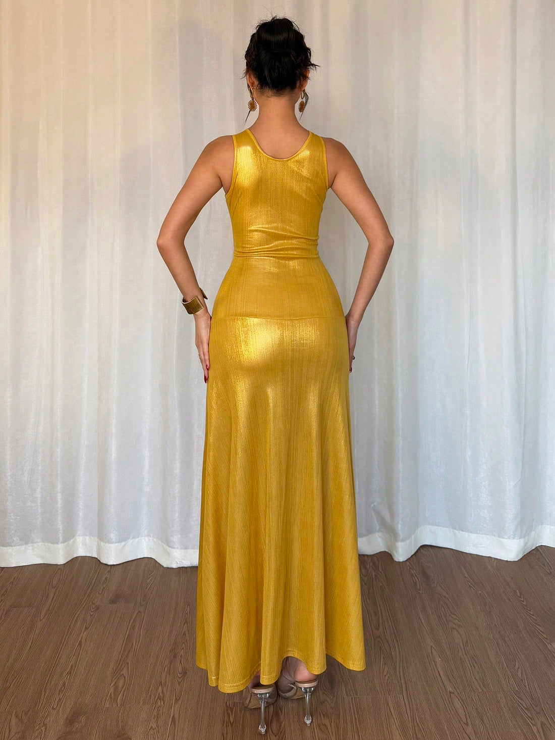 Turn heads at every party with this vibrant golden yellow satin dress! Featuring a chic halter neck and sparkling diamond accents, it’s perfect for celebrating in style. The luxurious satin fabric adds a smooth, radiant glow, making you shine bright on any special occasion. Dance, laugh, and dazzle effortlessly in this playful yet elegant statement piece.
