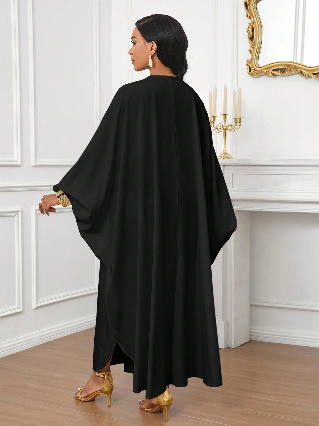 Get ready to shine in this Elegantly Chic Gold Sequined Burqa Dress for Women! Featuring stunning sequins and unique dolman sleeves, this dress will make you stand out at any event. With its elegant and chic design, you'll feel both stylish and comfortable in this must-have dress.