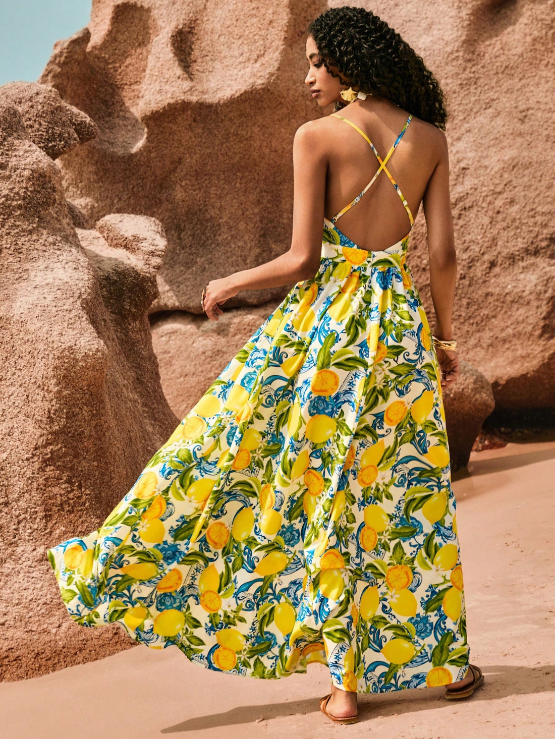 Unleash your ultimate vacation vibes with our chic & breezy backless maxi beach dress. Designed with a playful printed pattern, this dress will have you feeling stylish and comfortable while strolling on the beach. Say goodbye to boring vacation outfits and hello to ultimate vacation vibes!
