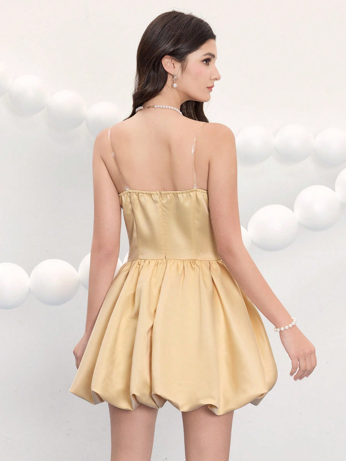 Slip into sophistication with this stunning spaghetti strap evening dress that's ready to turn heads at any celebration. Designed for those special moments—whether it's prom, a graduation gala, or an elegant night out—this dress combines timeless elegance with a flattering silhouette. The delicate spaghetti straps frame the shoulders beautifully, while the luxurious fabric drapes with grace. Perfect for creating unforgettable memories in style, this short dress is your go-to choice for looking absolutely ra