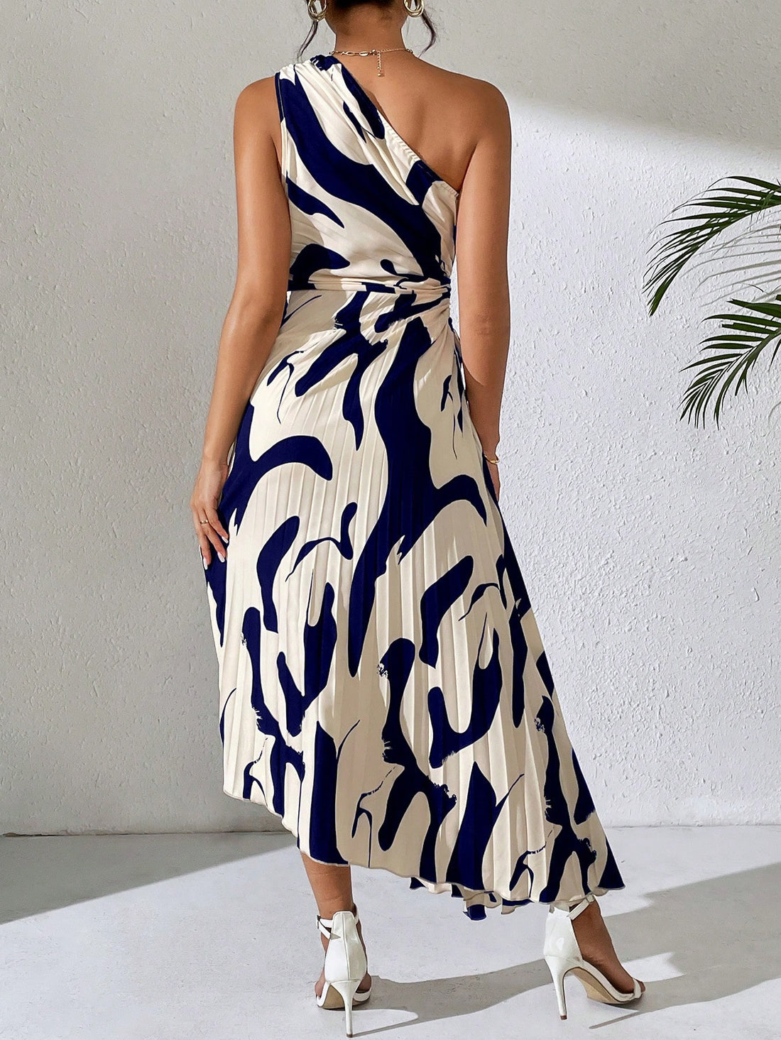 Step into summer with this trendy off-shoulder maxi dress! The unique hollow-out design adds a touch of edge and sophistication, while keeping you cool and comfortable. Perfect for any summer occasion, this dress will make heads turn.