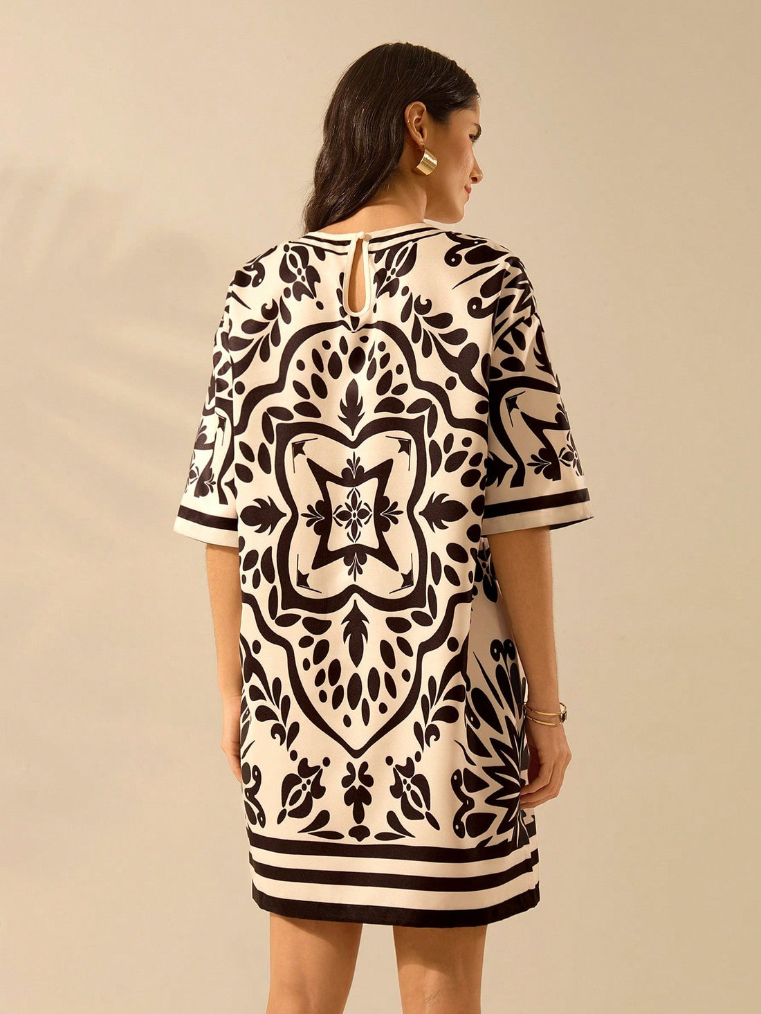 Embrace your inner free spirit with this breezy beige mini dress! Perfect for sandy strolls and sunset cocktails, our Boho Chic Tropical dress combines vintage-inspired details with carefree comfort. Slip it on, add some bangles, and voilà – you're vacation-ready in seconds! Who knew looking this effortlessly stylish could be so easy?