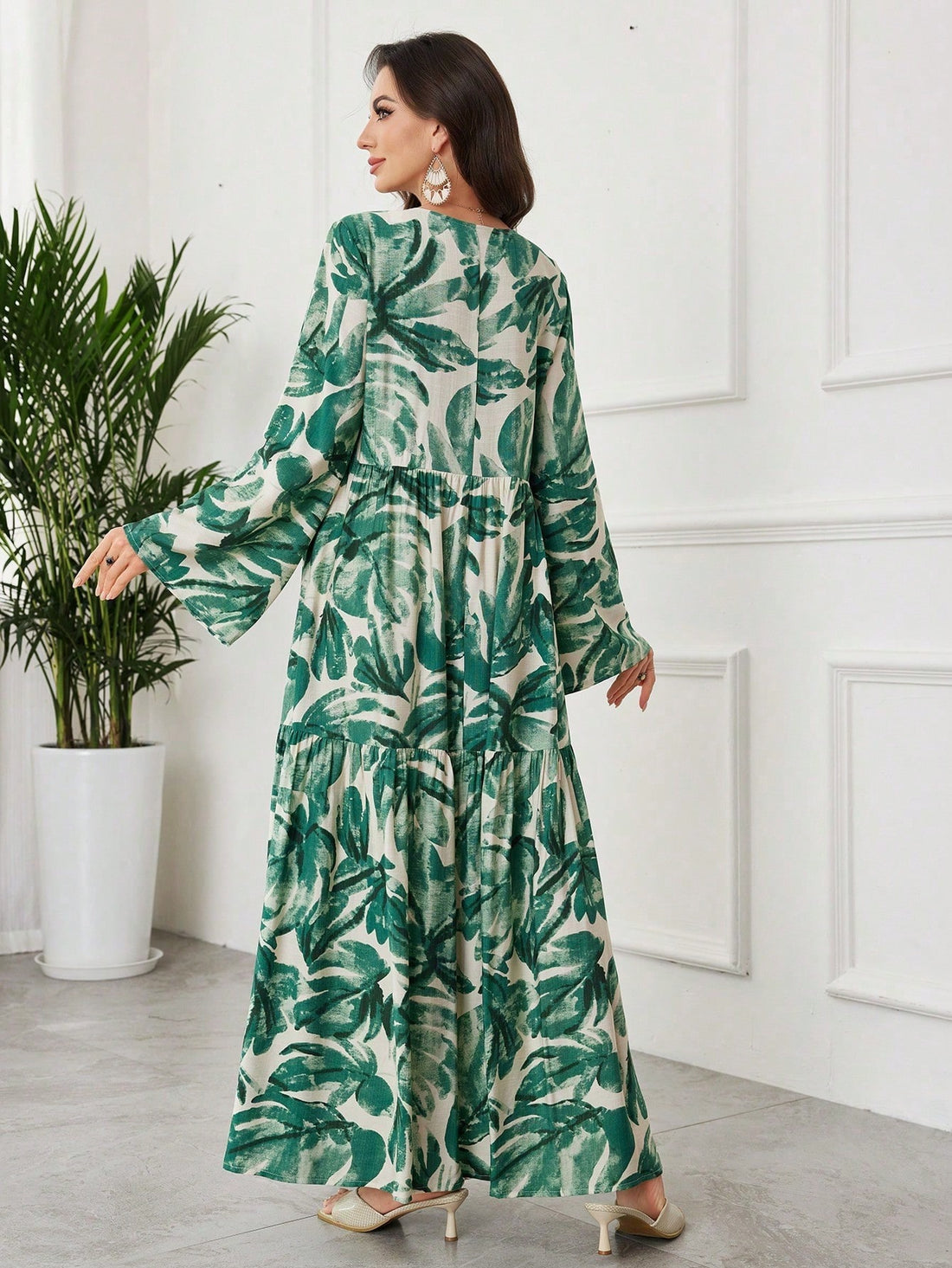 Twirl into elegance with this stunning bell sleeve dress that celebrates modest fashion with flair! Featuring a vibrant all-over tropical print, this Arabic-inspired piece combines cultural sophistication with contemporary style. The graceful bell sleeves add a touch of drama and movement, while the thoughtful design ensures you stay comfortable and covered. Perfect for special occasions, casual outings, or whenever you want to make a statement. Embrace your unique style with confidence in this show-stoppin