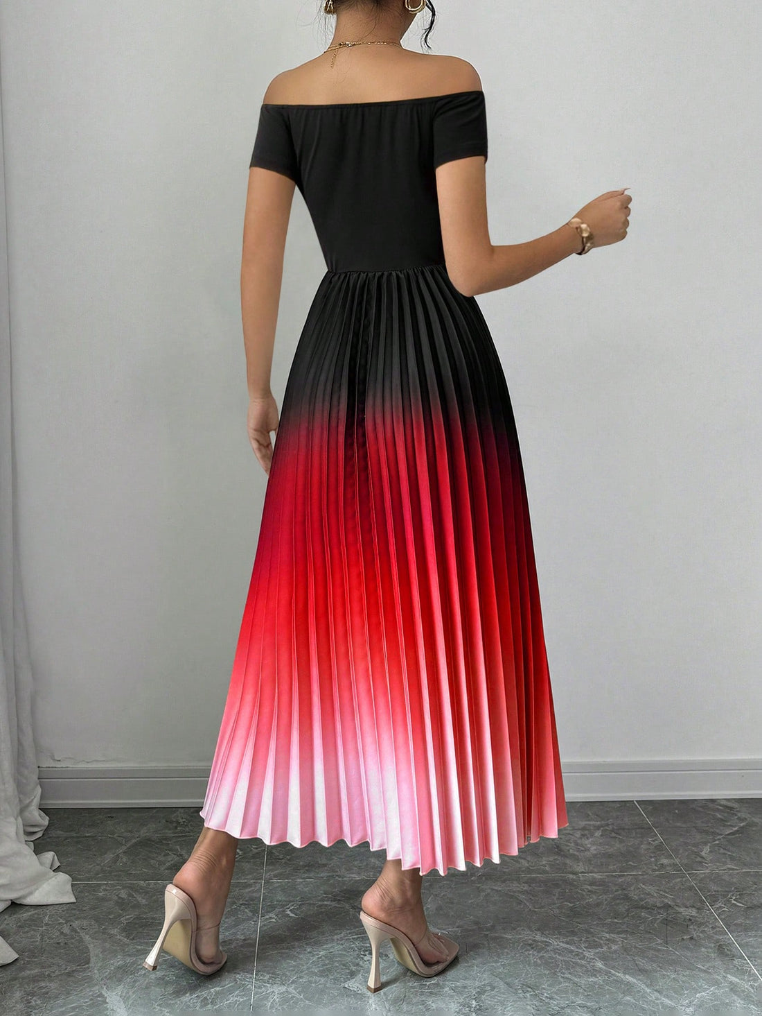 Be the life of the party in our Elegant Off-Shoulder Ombre Pleated Dress. With a cinched waist, this dress flatters any figure while the ombre pleated design adds a touch of elegance. Perfect for any occasion, you'll stand out in this unique and stylish dress.