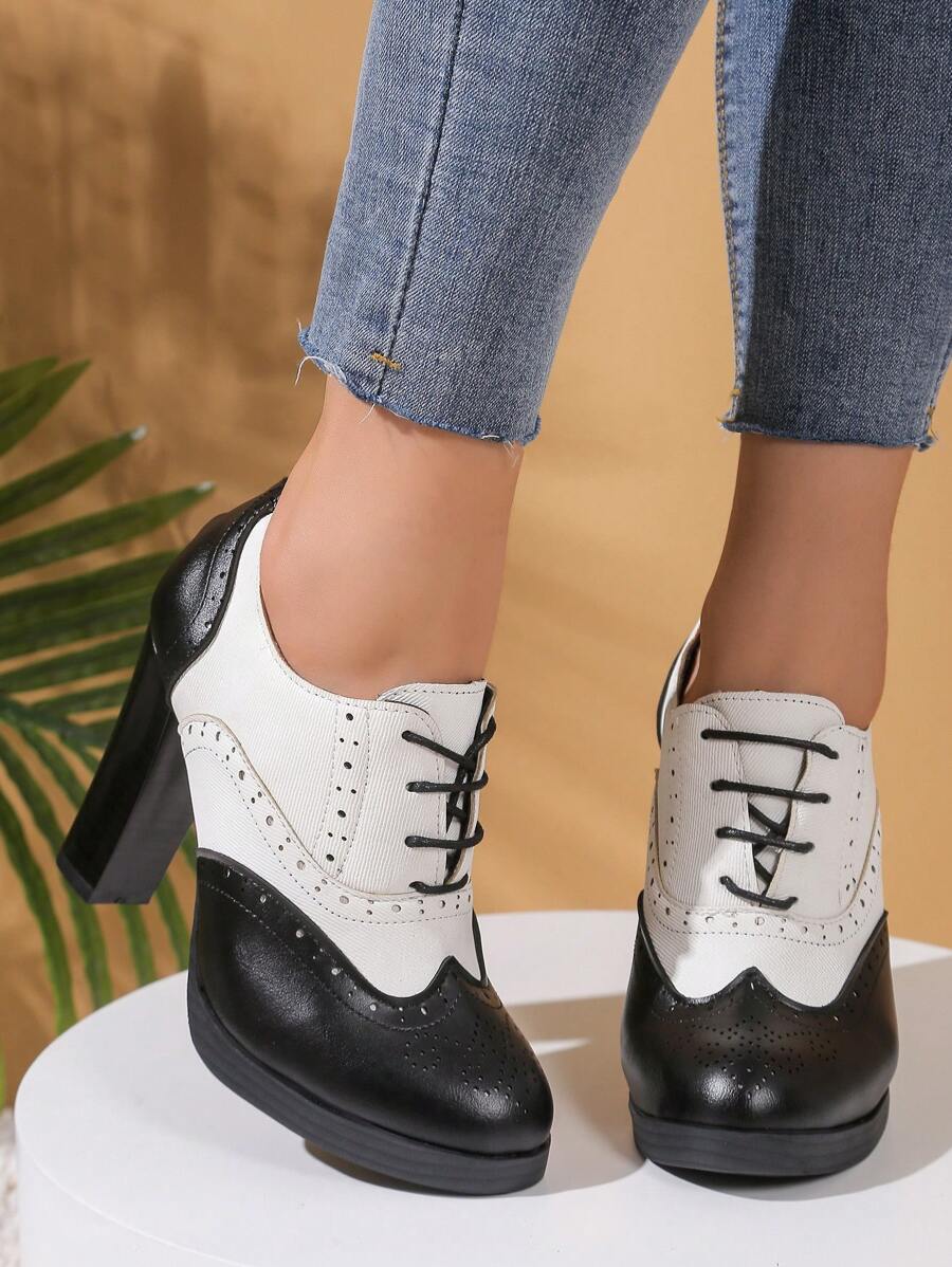 Step out in style with these vintage-inspired women's brogue Oxford high heels. Featuring a bold black and white design, thick sole for extra comfort, and a classic lace-up front, they blend timeless charm with modern flair. Perfect for adding a playful twist to any outfit while keeping you confidently on your feet all day long.