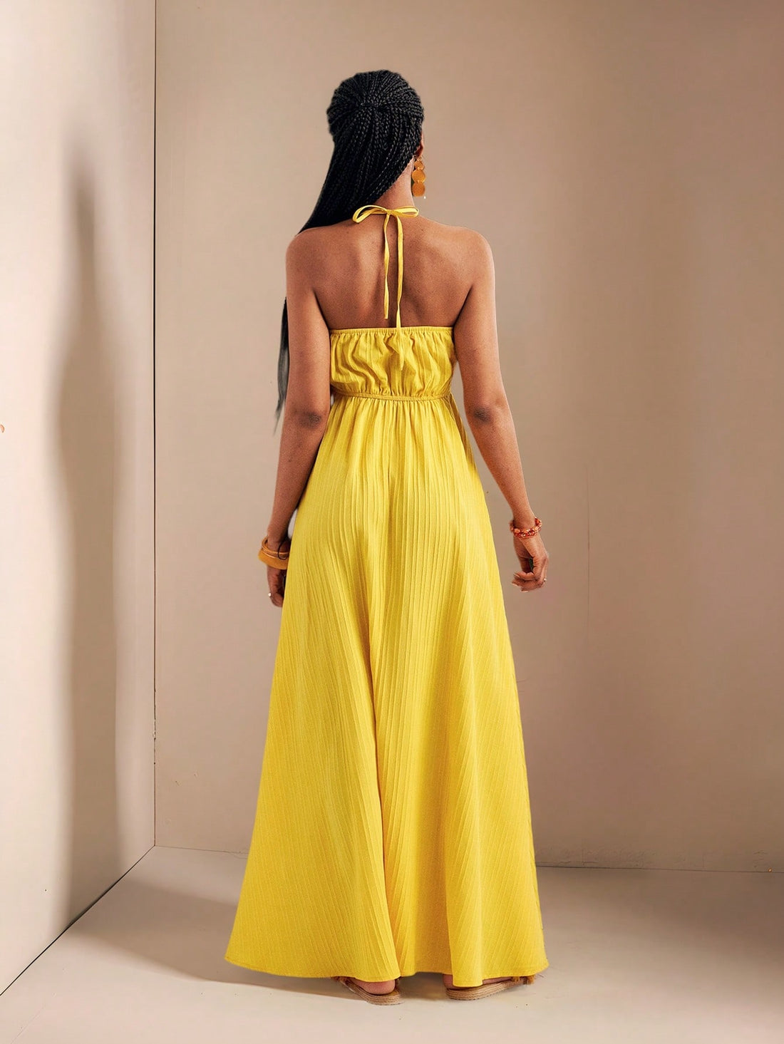 Get ready to turn heads this summer with our Chic Yellow Sea Stripe Halter Neck Maxi Dress! The effortlessly stylish design will have you looking chic in no time. Perfect for any occasion, this dress will keep you cool and comfortable while still making a statement. Don't miss out on this must-have addition to your summer wardrobe!