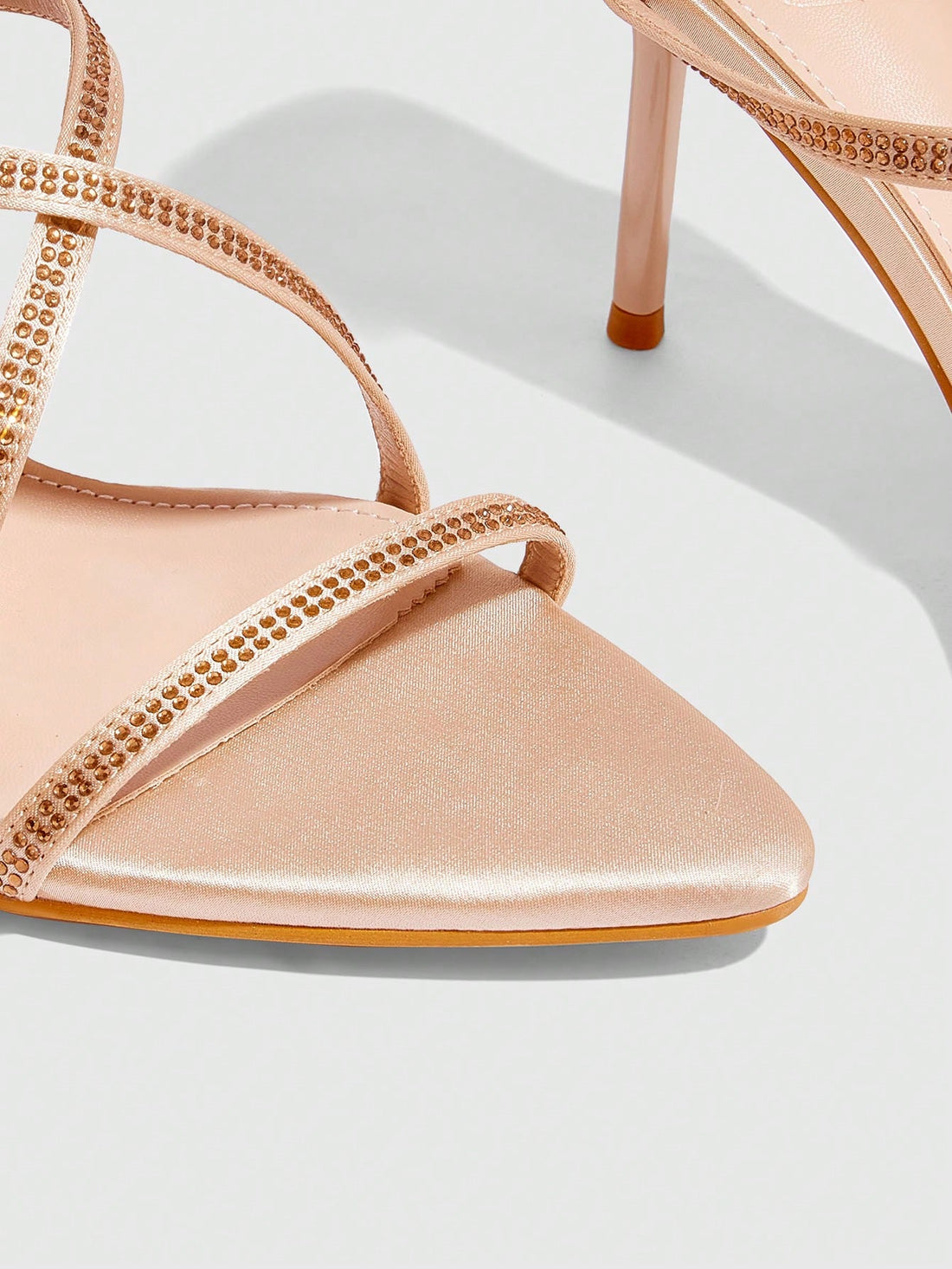 Step into summer with these chic pointed toe stiletto sandals, perfect for turning heads on warm nights and vacation getaways. Their sleek design adds a playful touch to any outfit, elevating your style effortlessly. Whether dancing under the stars or strolling seaside, these heels bring confidence and flair to every step.