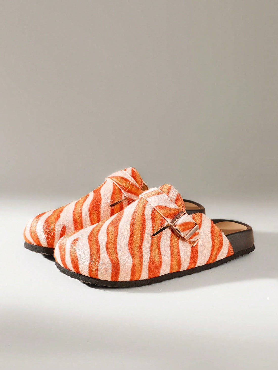 Step into understated elegance with these minimalist slip-on flats—the ultimate wardrobe essential for anyone who believes less is more. Designed for effortless transitions from morning coffee runs to evening outings, these shoes deliver comfort without compromising on style. The sleek silhouette pairs seamlessly with everything from jeans to dresses, while the slip-on design means zero fuss getting ready. Perfect for the modern woman who values both practicality and polish, these flats prove that sometimes