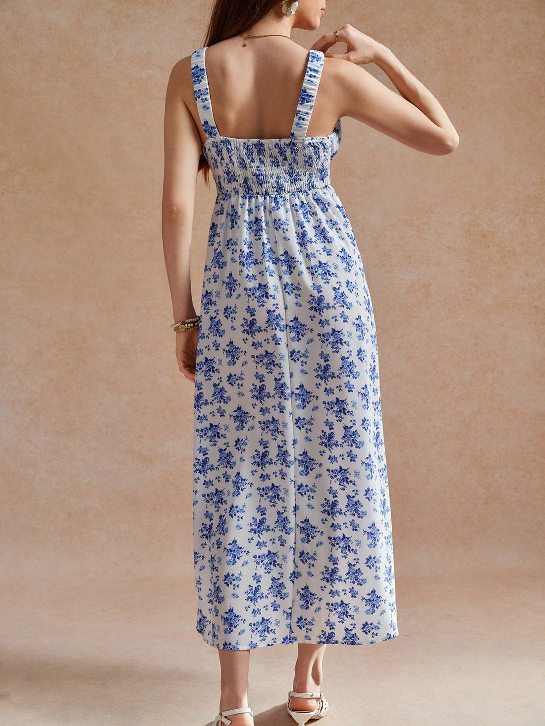 Introducing our Elegant Slim Fit Floral Print Long Dress, perfect for Spring and Summer! The beautiful white and blue design adds a touch of elegance, while the suspender straps keep it playful. With a slim fit, this dress is sure to flatter your figure and make you stand out.