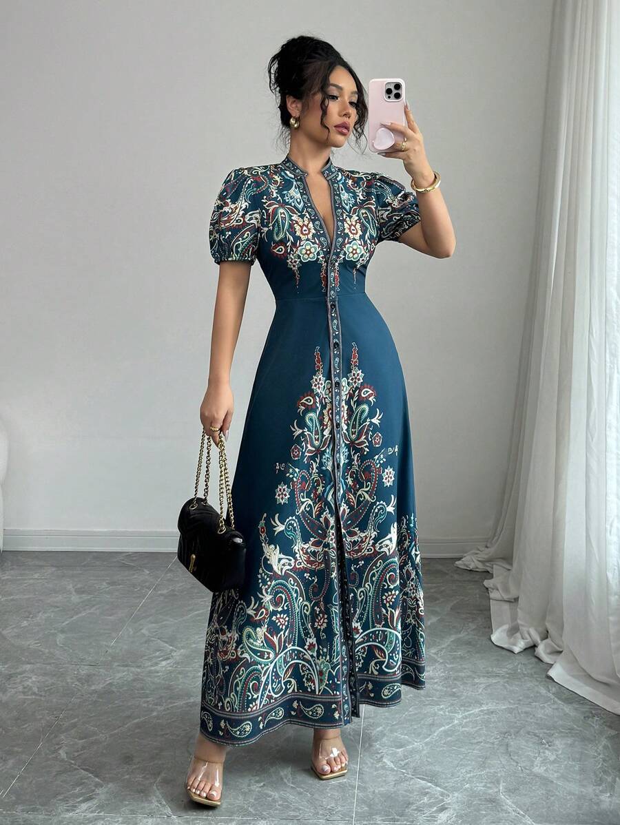 Elevate your wardrobe with this stunning floral print long dress, featuring a flattering deep V-neckline and fitted silhouette. The intricate floral design brings timeless elegance to any occasion, while the flowing length offers graceful movement and sophistication. Perfect for evening events, special occasions, or elevated everyday wear. The fitted bodice flatters your figure, and the luxurious fabric drapes beautifully. A versatile piece that transitions seamlessly from day to night