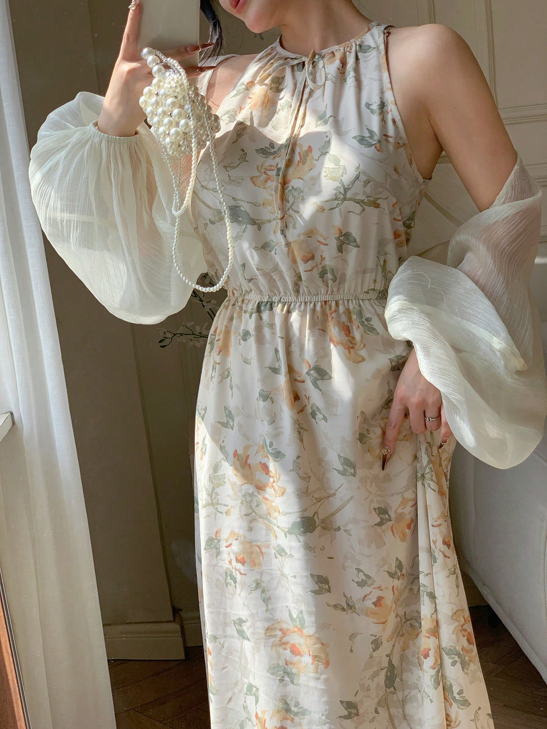 Elevate your wardrobe with this charming 2-piece set from the Modelyn Collection! Pair the delicate mesh lantern sleeve top with the graceful floral print dress for an effortlessly chic look that transitions from day to night. The romantic lantern sleeves add a touch of whimsy, while the flowing dress brings timeless elegance. Perfect for brunch dates, garden parties, or whenever you want to feel fabulous and put-together. Mix, match, and make it your own!