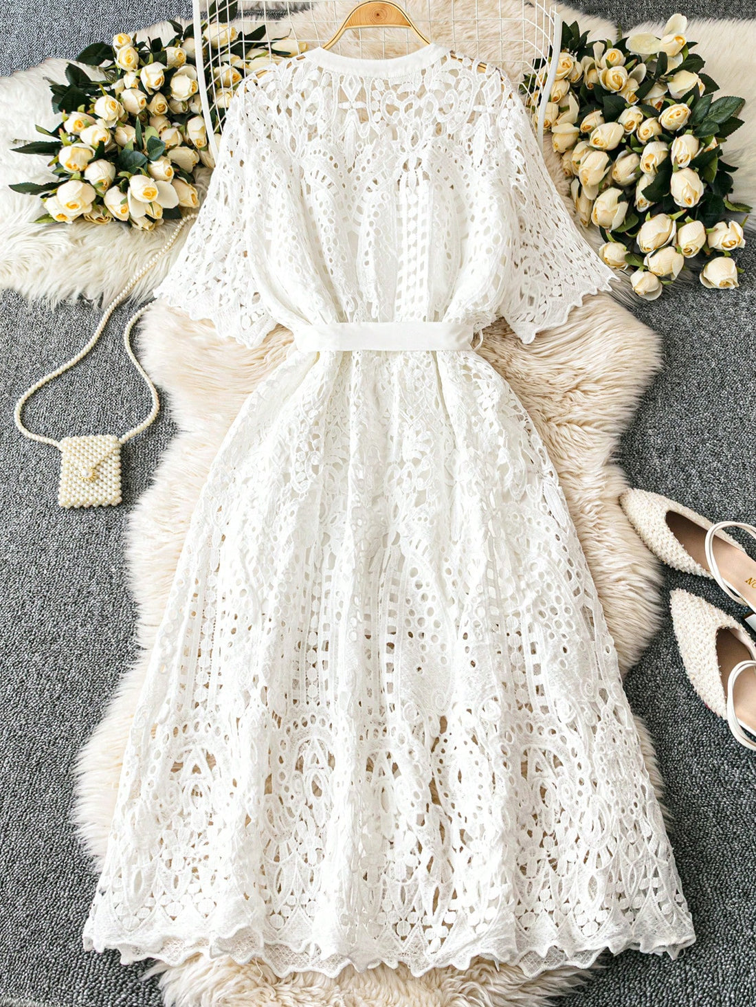 Step out in style and comfort with this playful plus size lace dress, featuring a charming solid color design and delicate pearl buttons. Perfect for casual holiday gatherings, it combines elegance with ease, making every moment feel special and fun.