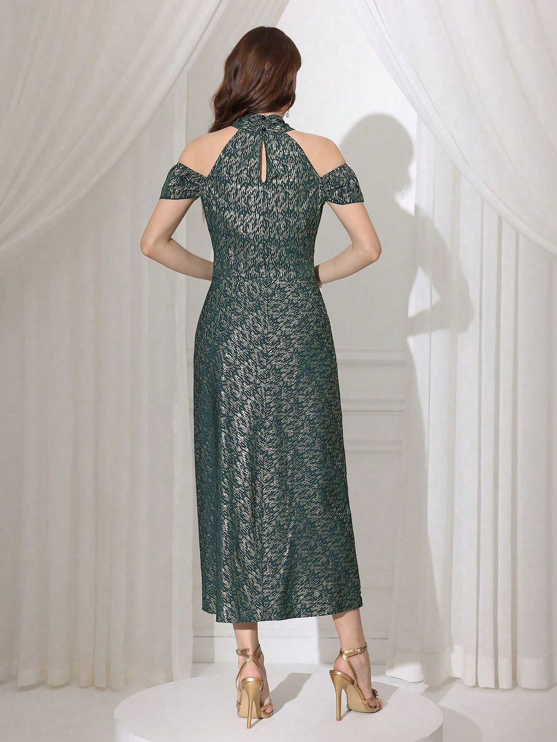 Dress to impress with our Elegant Cinched Waist Gold Foil V-Neck Dress. This stylish dress is perfect for any fashionable occasion, and its cinched waist adds a flattering touch. Rock that gold foil and turn heads with your chic style!