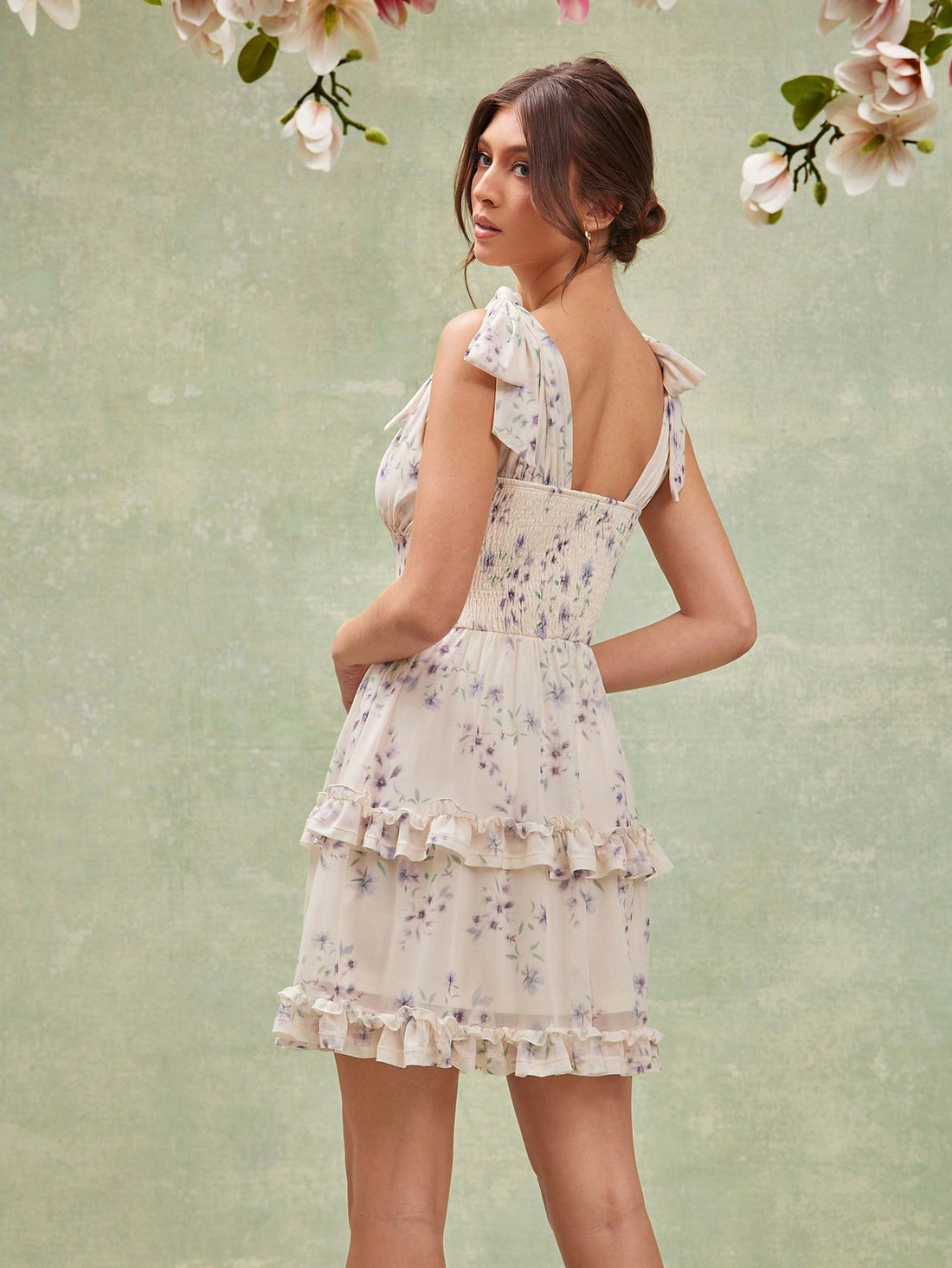 Step into sunny days with this playful sleeveless summer dress, boasting a charming floral print and flirtatious ruffle hem. Lightweight and breezy, it brings effortless style and twirl-ready fun to your warm-weather wardrobe. Perfect for picnics, beach strolls, or casual get-togethers where comfort meets cute.