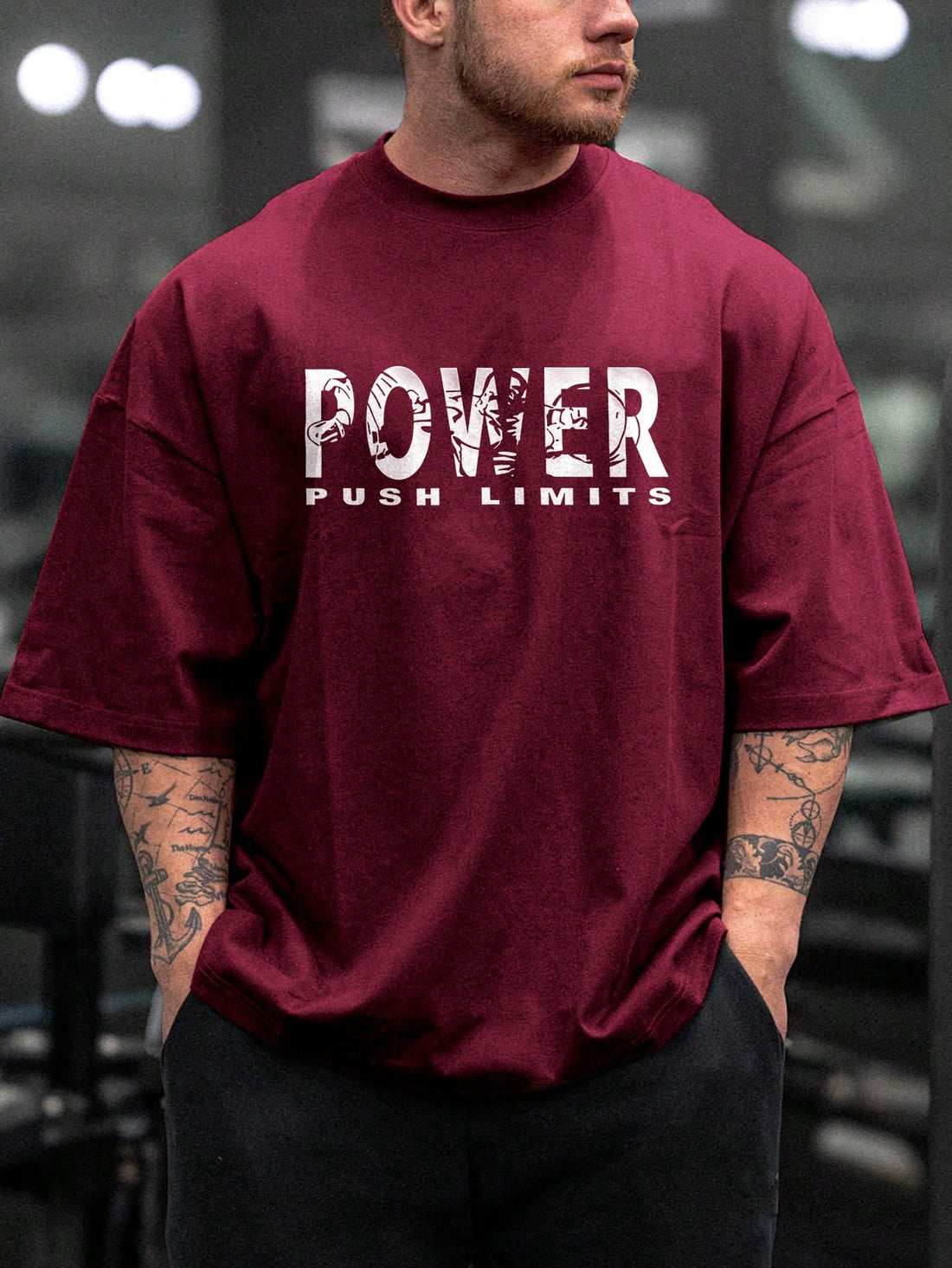 Get in style for your active lifestyle with this Trendy Men's Fitness T-Shirt. Made with a comfortable round neck and short sleeve design, this shirt not only looks good but also supports your active lifestyle. The bold letter print adds a touch of playfulness to this sporty tee.