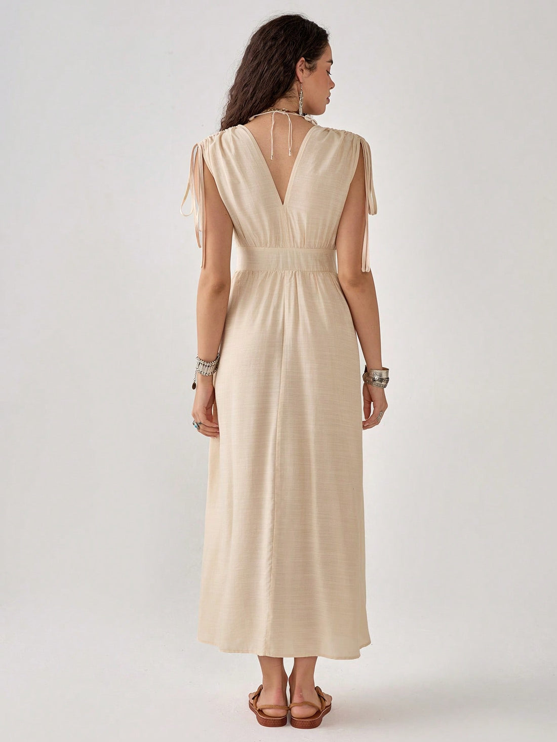 Slip into vacation mode with our breezy Bohemian V-Neck dress! This flowy resort essential features a flattering V-neckline that's just right for showing off your favorite necklaces. Perfect for beach strolls or sunset dinners, it packs without wrinkles and looks fabulous with minimal effort. Just add sandals and you're ready for whatever adventure the day brings!