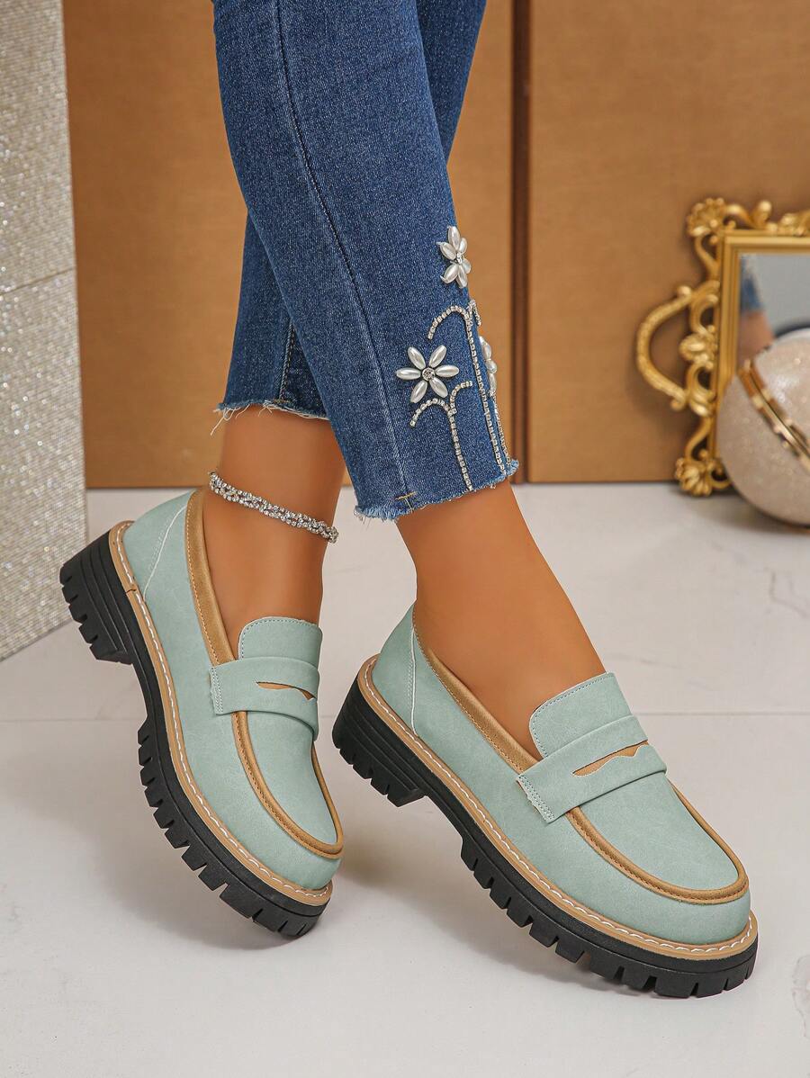 Add some flair to your shoe collection with these stylish slip-on loafers. Made with cowhide and a thick anti-slip sole, they're as practical as they are fashionable. The contrast color design adds a touch of fun to your outfit. Perfect for those who want style and functionality!