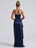 Black satin gown back view showing crossed straps and floor-length hem