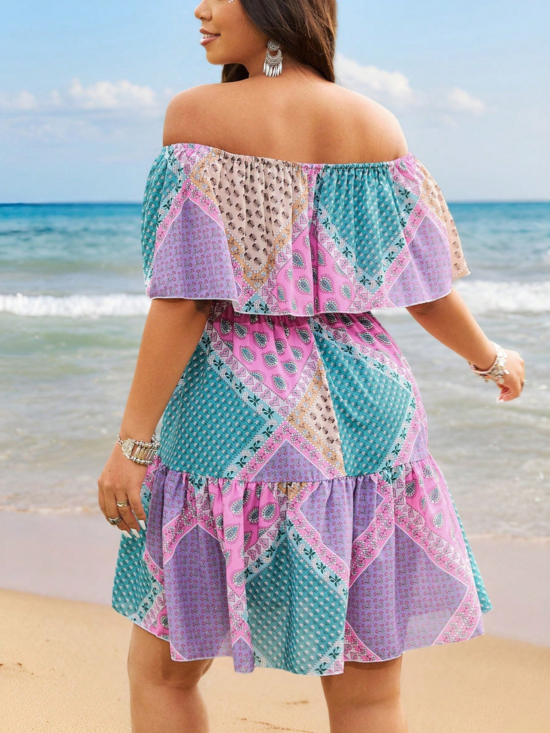 Flaunt your curves in this playful off-shoulder dress that's all about making a statement! The delicate ditsy floral pattern adds a touch of whimsy while the elegant silhouette celebrates your beautiful shape. Perfect for garden parties, brunch dates, or whenever you feel like turning heads and collecting compliments!