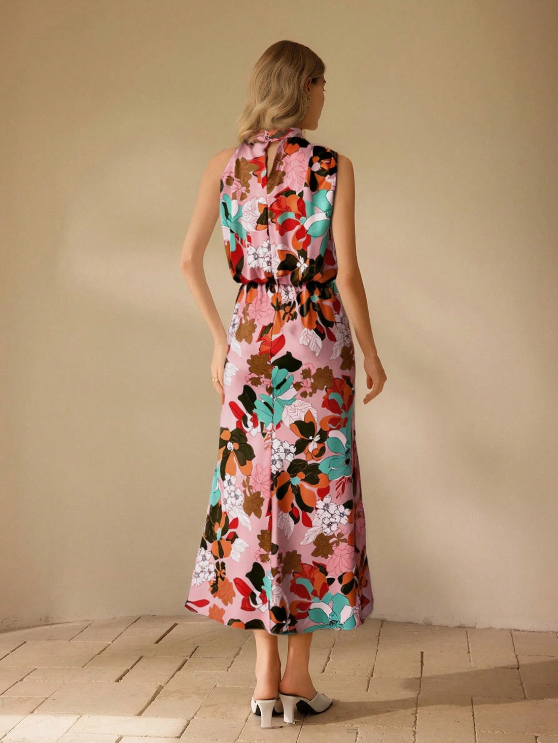 Add a touch of elegance to any occasion with our Floral Print Midi Dress for Women. Featuring a beautiful floral print, this dress is perfect for any event. Look and feel your best in this stylish and versatile piece. Perfect for any occasion!