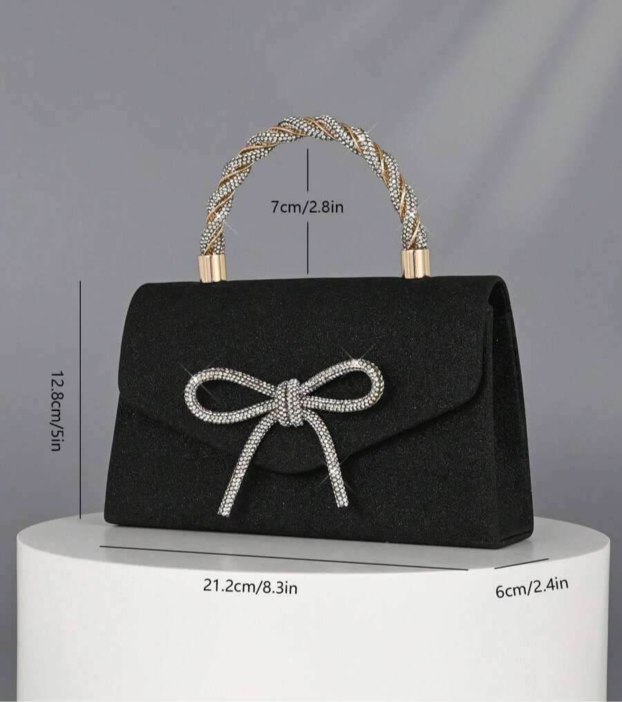 Add a dazzling touch to your evening with this Sparkling Gold Clutch. Covered in shimmering crystals, it’s the perfect playful companion for parties, weddings, or any night you want to shine bright. Compact yet spacious enough for your essentials, this handbag makes every moment feel like a celebration.