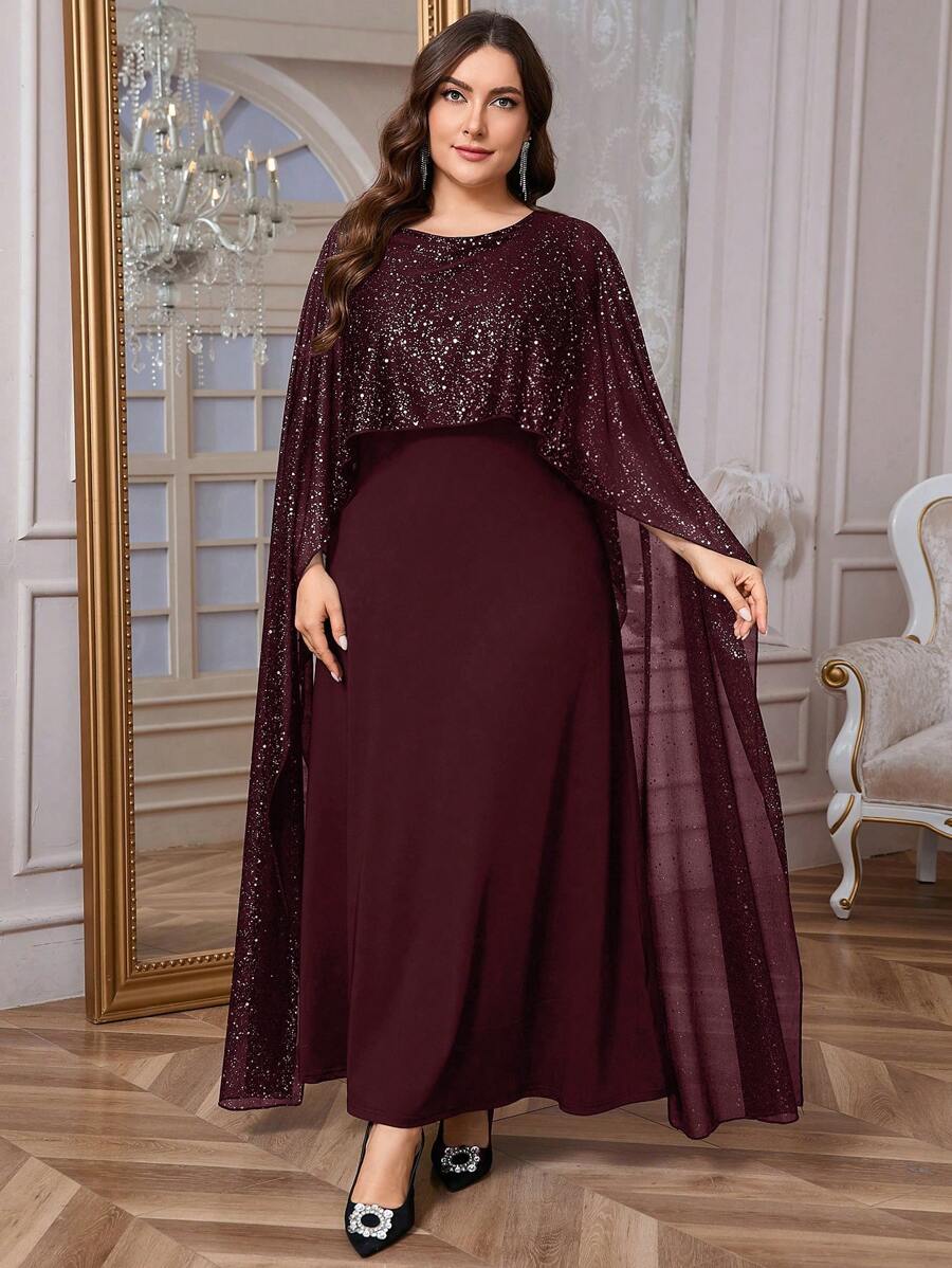 Make a statement in this stunning black maxi dress that effortlessly transitions from day to night. The flowing silhouette pairs beautifully with a shimmering cape that catches the light with every move, adding drama and sophistication to your look. Whether you're heading to a cocktail party, jetting off on vacation, or enjoying an intimate dinner date, this versatile piece delivers elegance with a touch of glamour. The timeless black palette ensures it works with everything in your wardrobe, while the luxe