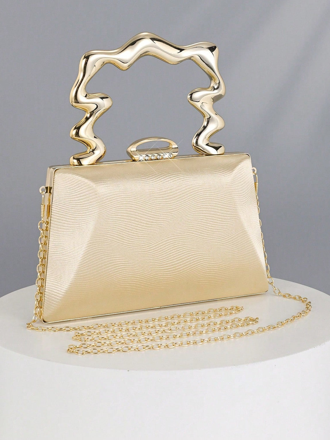 Turn heads with the Sleek Metallic Cuff Clutch Bag, your new go-to for parties and events! This minimalist leather purse combines shiny metallic flair with a smooth, elegant design, making it perfect for carrying your essentials with style. Light and compact, it adds just the right pop of glam without weighing you down—because who says practicality can’t be dazzling? Ready to sparkle through every celebration!