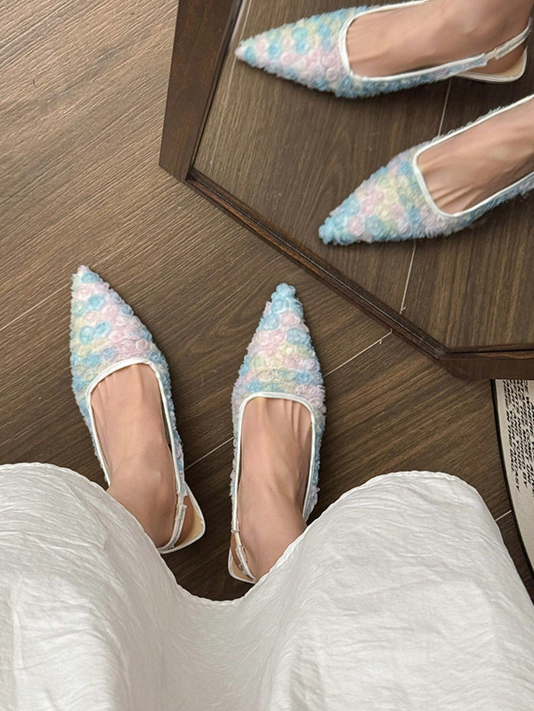 Step into style with these Elegant Floral Embellished Flats. Featuring a pointed toe and slingback design, these flats add a touch of sophistication to any outfit. The delicate floral embellishments bring a playful and feminine touch, making them perfect for any occasion. Comfortable and versatile, these flats are a must-have for any fashion-forward woman.