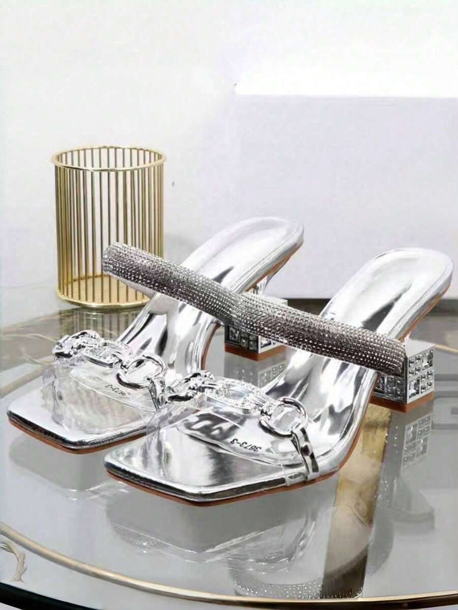 Step into sunny days with these Chic Gold Single-Strap Sandals! Their bold chunky asymmetric heel adds a fun twist to your summer look, while the sleek gold strap keeps things effortlessly stylish. Perfect for dancing through warm evenings or elevating your everyday outfit, these sandals bring playful charm and confident flair wherever you go.