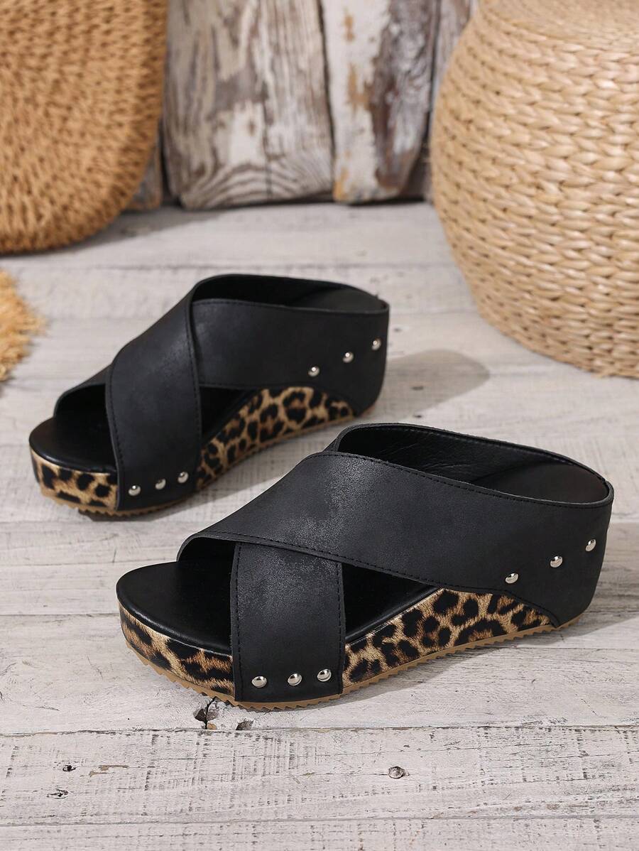 Step into summer with these Trendy Leopard Print Platform Sandals! Featuring an open toe design and bold leopard print, these casual slides add a fun, fierce touch to any outfit. The platform sole gives you extra height and comfort, perfect for sunny days out or casual hangouts. Let your feet do the talking with these playful, stylish sandals that blend fashion and ease effortlessly.