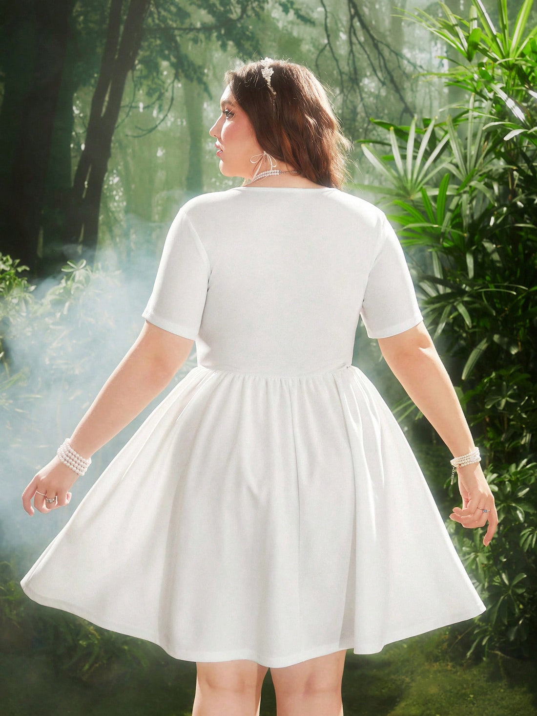 This European-inspired mini dress features a perfectly fitted waist and a playful bow knot, making it the ultimate choice for birthday parties and cocktails. With its elegant pleats and unique style, this dress is sure to turn heads and make you feel like a true fashionista (without even trying!).