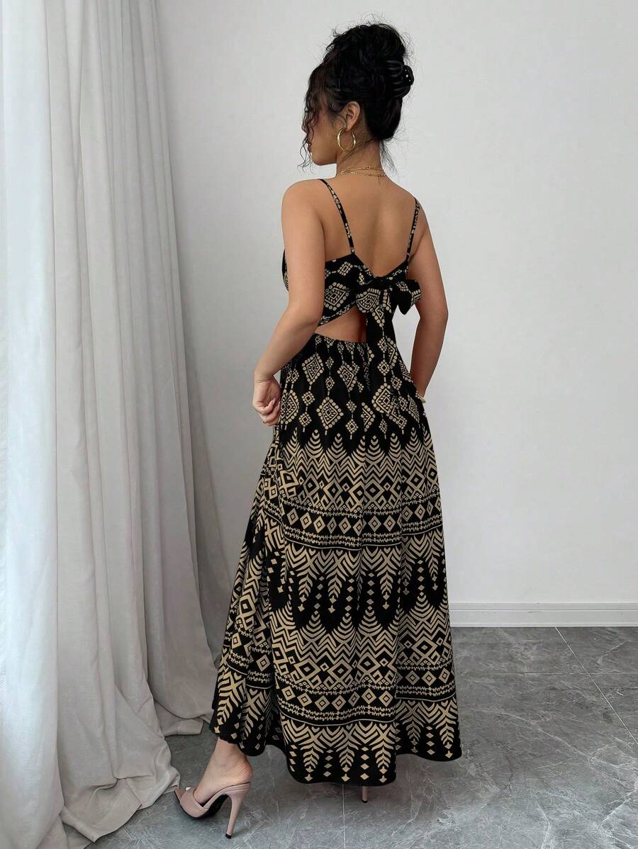 Turn heads wherever you go with this Geometric Print Backless Strap Dress. Its playful, vibrant pattern pairs perfectly with the breezy, backless design to keep you cool and stylish on vacation or at any event. Whether you're strolling the boardwalk or dancing under the stars, this dress adds a fun, elegant flair to your wardrobe. Embrace effortless charm and let your summer style shine!