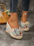 Side view of boho bowknot wedge sandal with textured braided-look base.