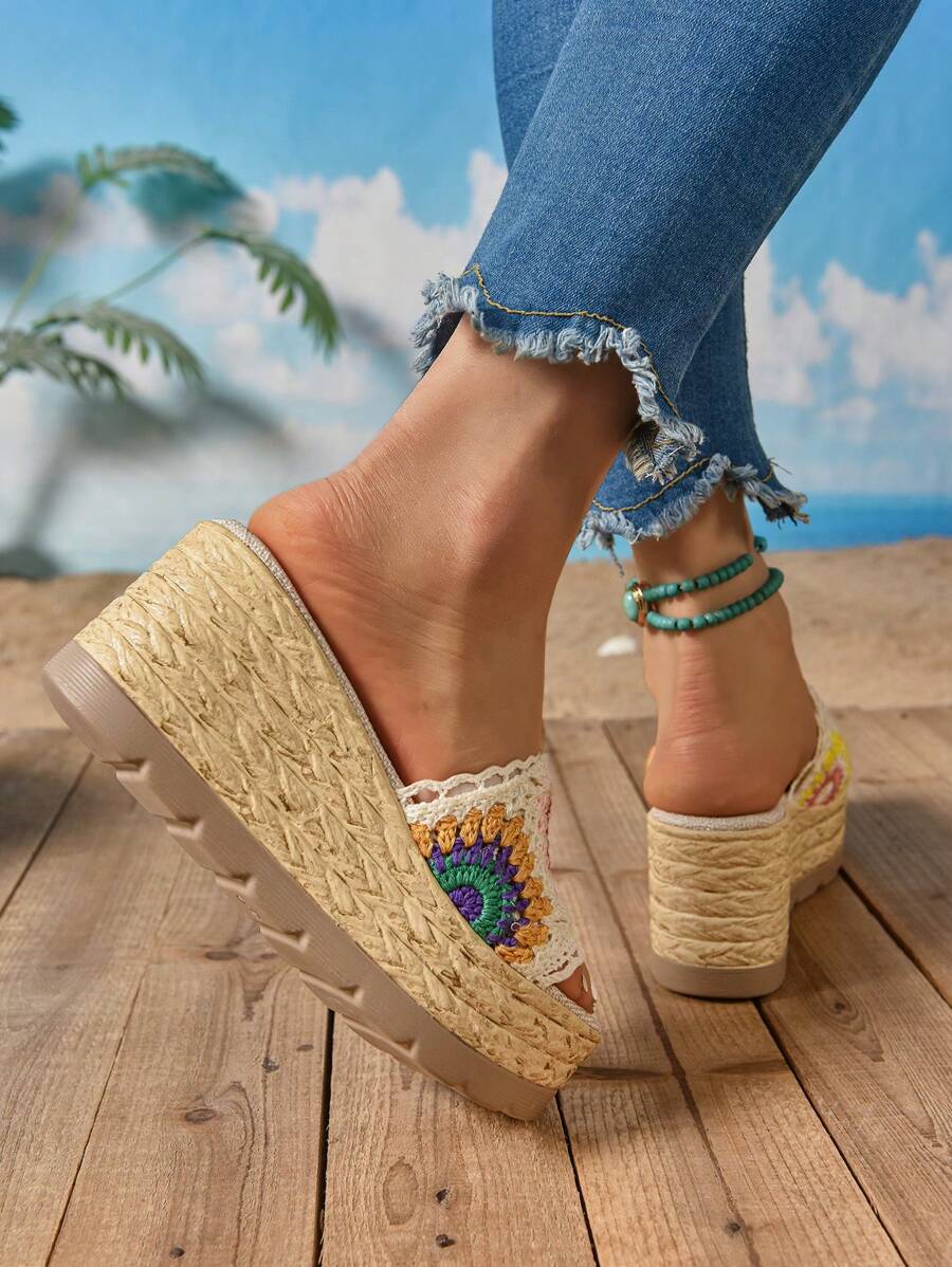 Rear side view of multicolor crochet platform slides showing the lugged outsole