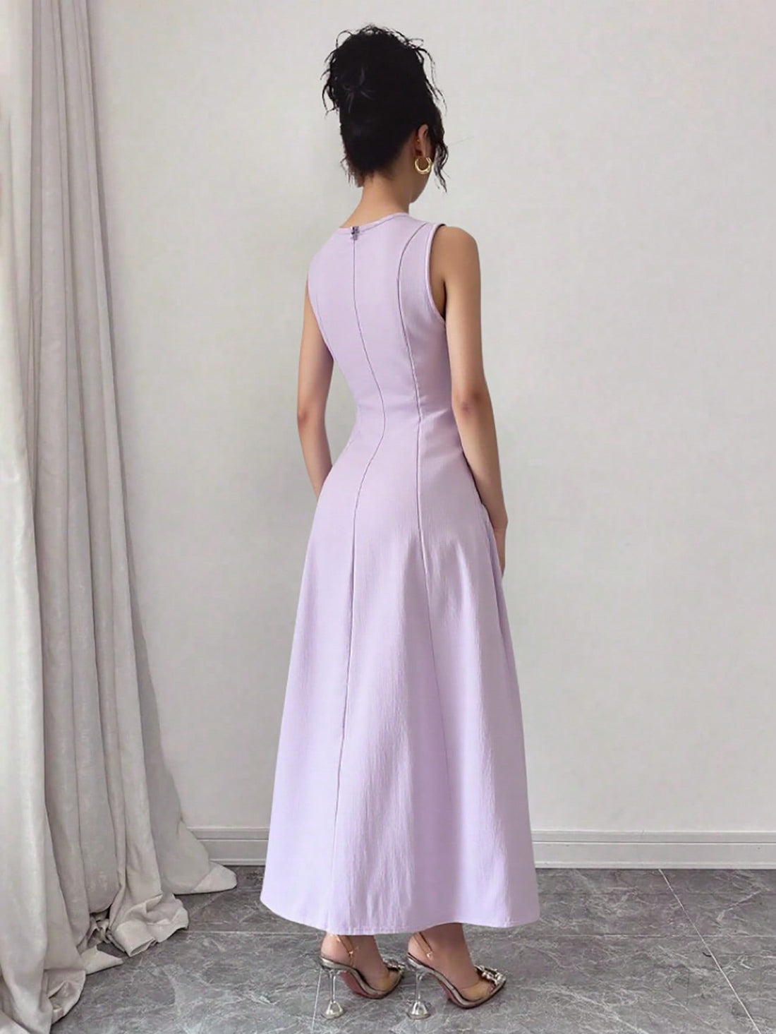 Effortlessly stylish and oh-so-chic, this sleeveless dress is a must-have for any fashion-forward woman. The ruched detailing and drawstring waist give this solid color dress a flattering silhouette, perfect for any occasion. Get ready to turn heads and make a statement with this versatile piece!