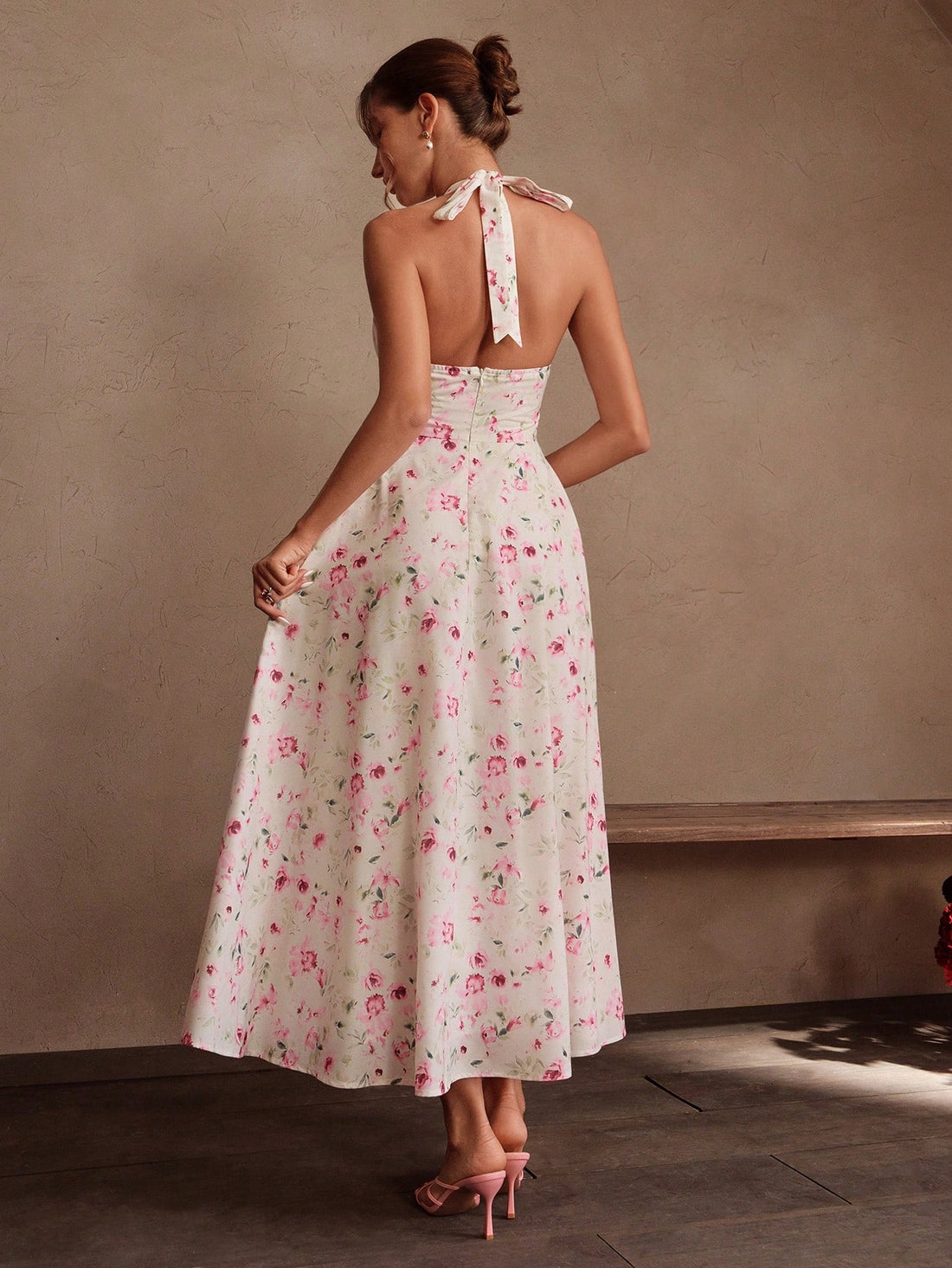 Step into the spotlight with this Elegant Floral Backless Halter Dress, designed to turn heads wherever you go. Its graceful halter neckline and daring backless cut offer a perfect blend of charm and confidence. The vibrant floral pattern adds a fresh, playful touch, making it your go-to dress for garden parties, date nights, or any occasion that calls for a splash of sophistication and fun. Feel fabulous and free in a dress that moves with you and celebrates your unique style.