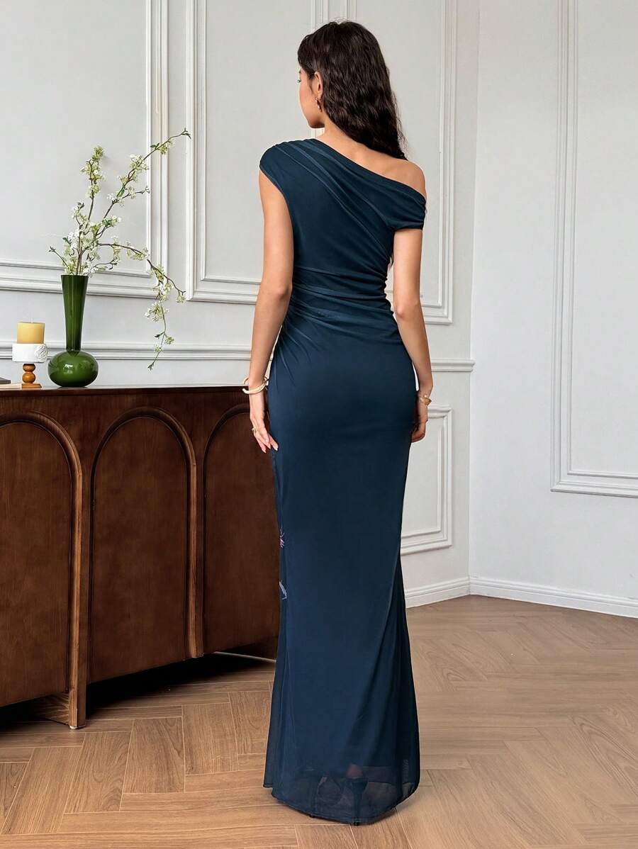 Turn heads with this Elegant Floral Off-the-Shoulder Mermaid Dress—your perfect partner for chic weddings and unforgettable special occasions. The off-the-shoulder design highlights your neckline while the mermaid silhouette beautifully hugs your curves, making every step a statement. Covered in delicate floral patterns, this dress combines romance with a touch of whimsy, ensuring you dance the night away in style and confidence.