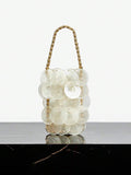 Pearl white shell disc mini bag with gold bead handle and drawstring top