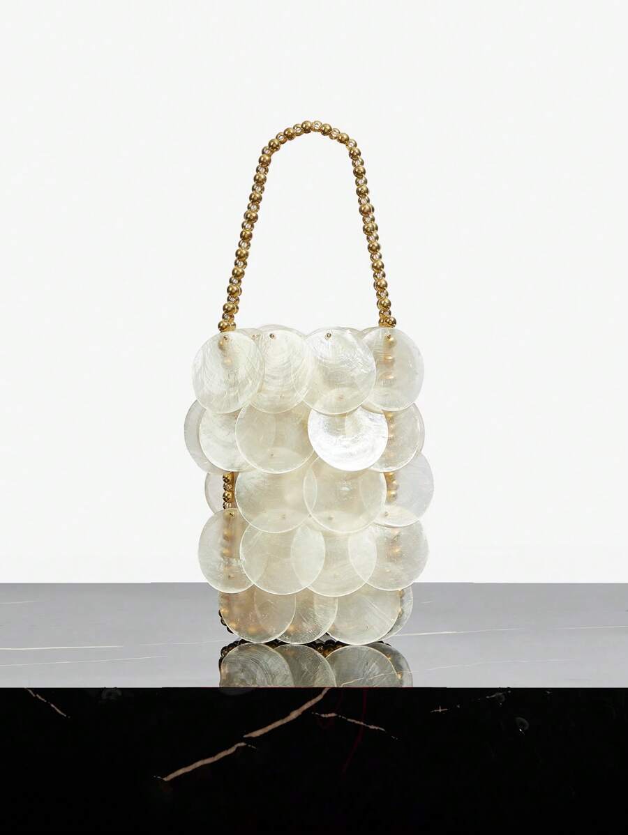 Pearl white shell disc mini bag with gold bead handle and drawstring top