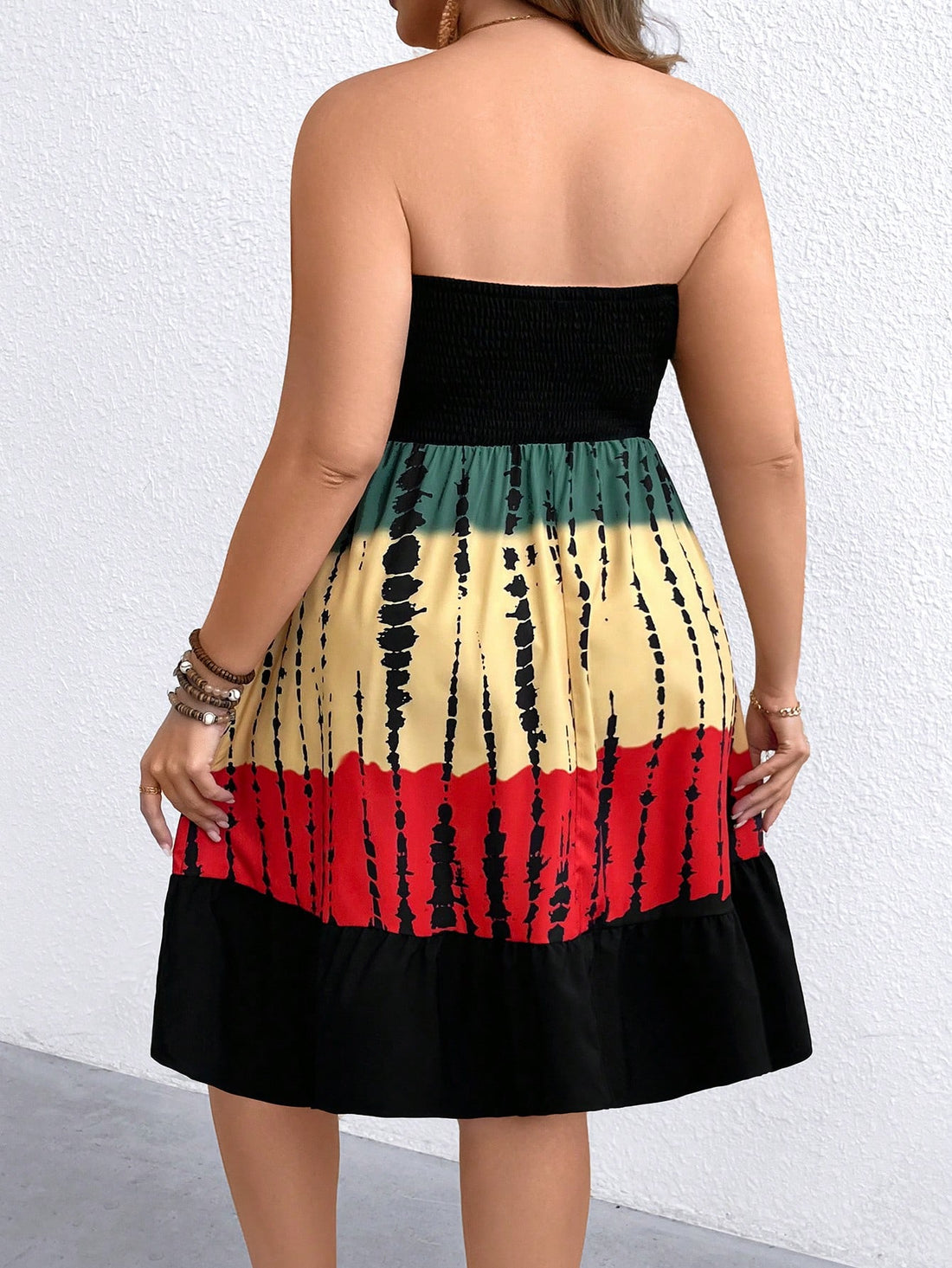 Get ready to turn heads with this Chic Tie-Dye Bodycon Tube Top Mini Dress! Its vibrant colors and snug fit make it perfect for effortless vacation vibes. Whether you're beachside or out for sunset cocktails, this playful dress keeps your style fresh and fun all day long.