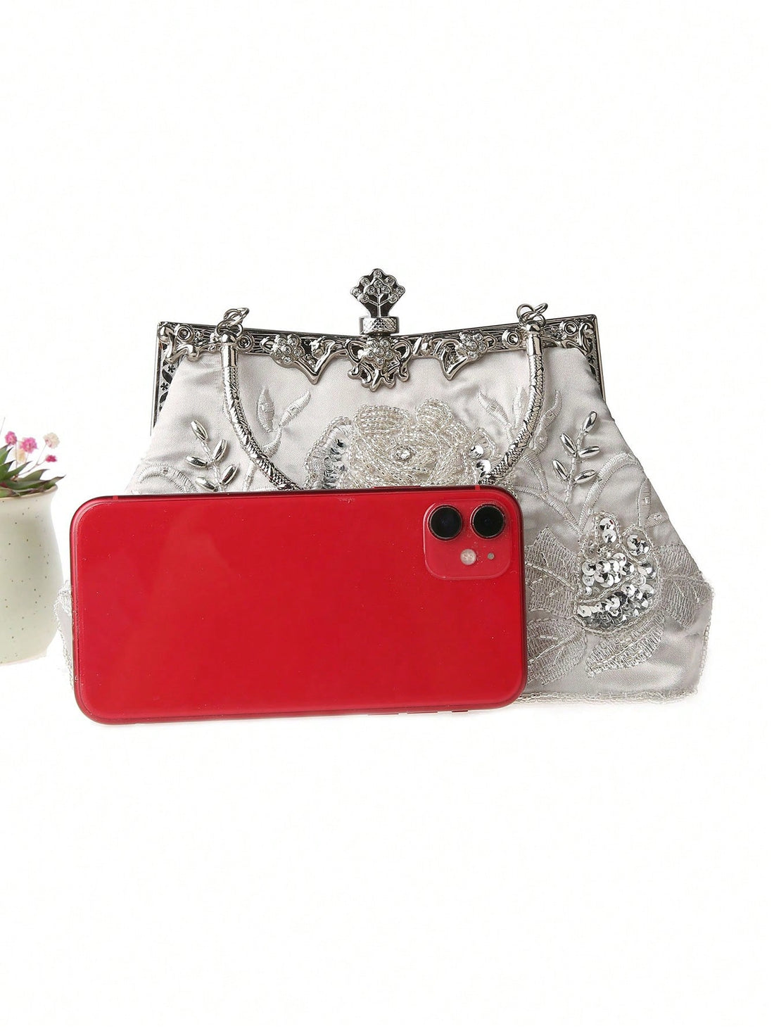 Add a sparkle to your night with this Rhinestone Trapezoid Evening Clutch! Perfectly sized for your essentials, its dazzling rhinestone design turns heads at any event. Whether it’s a gala or a night out, this clutch combines glam and function to keep you shining all evening long.